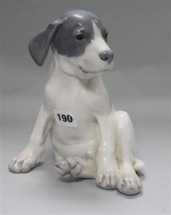 A Royal Copenhagan model of a puppy H.20cm